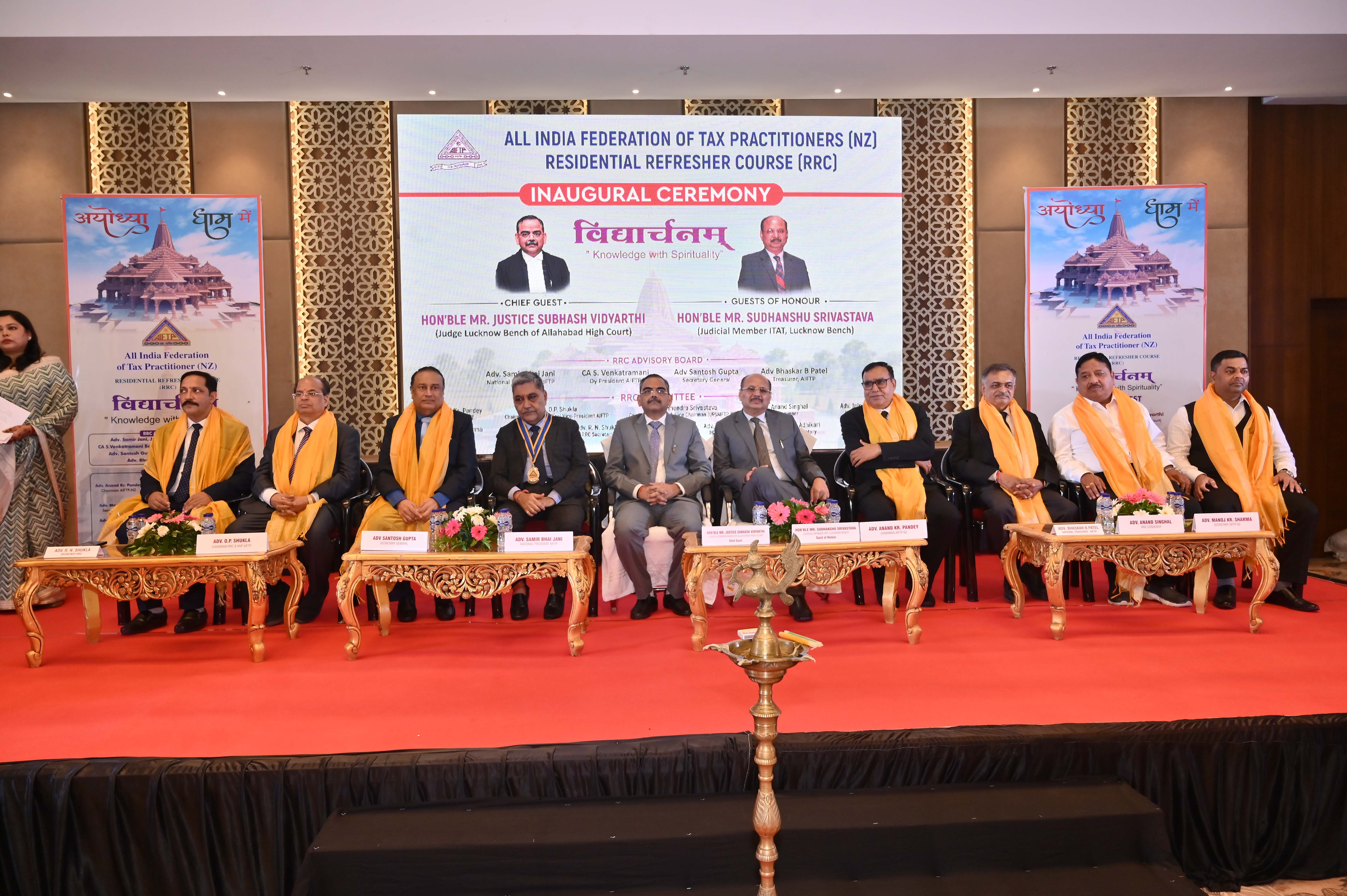 Inaugural Session: Seen from Left to Right S/Shri Rajendra Nath Shukla, RRC Secretary, O. P. Shukla, National Vice President, AIFTP-NZ, Santosh Gupta, Secretary General, AIFTP, Samir S. Jani, National President, AIFTP, Hon'ble Mr. Sudhanshu Srivastava, Judicial Member, ITAT, Lucknow Bench, Hon'ble Mr. Justice Subhash Vidyarthi, Judge, Lucknow Bench of Allahabad High Court, Anand Kumar Pandey, Chairman, AIFTP-NZ, Bhaskar B. Patel, Treasurer, AIFTP, Anand Singhal, RRC Convenor and Manoj Sharma, Hon. Secretary, AIFTP-NZ.